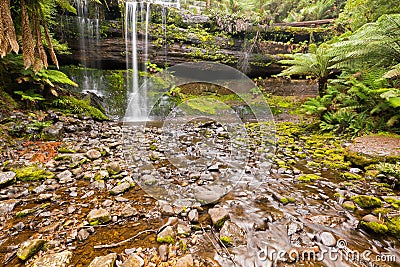 Russell Falls, tieredâ€“cascade waterfall with stone covered wit Stock Photo